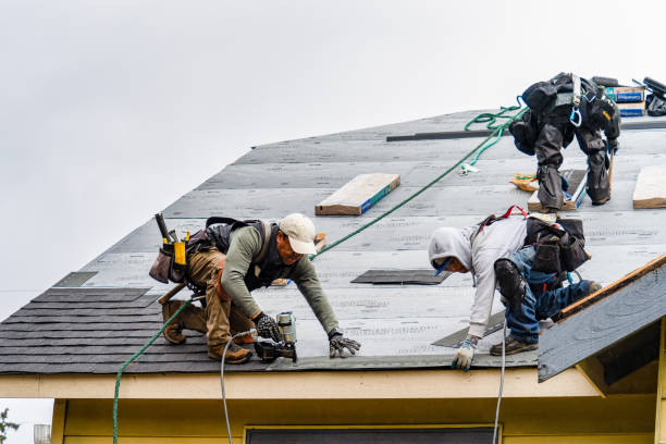 Professional Flat Roof Repair technician working in Oxbow, OR
